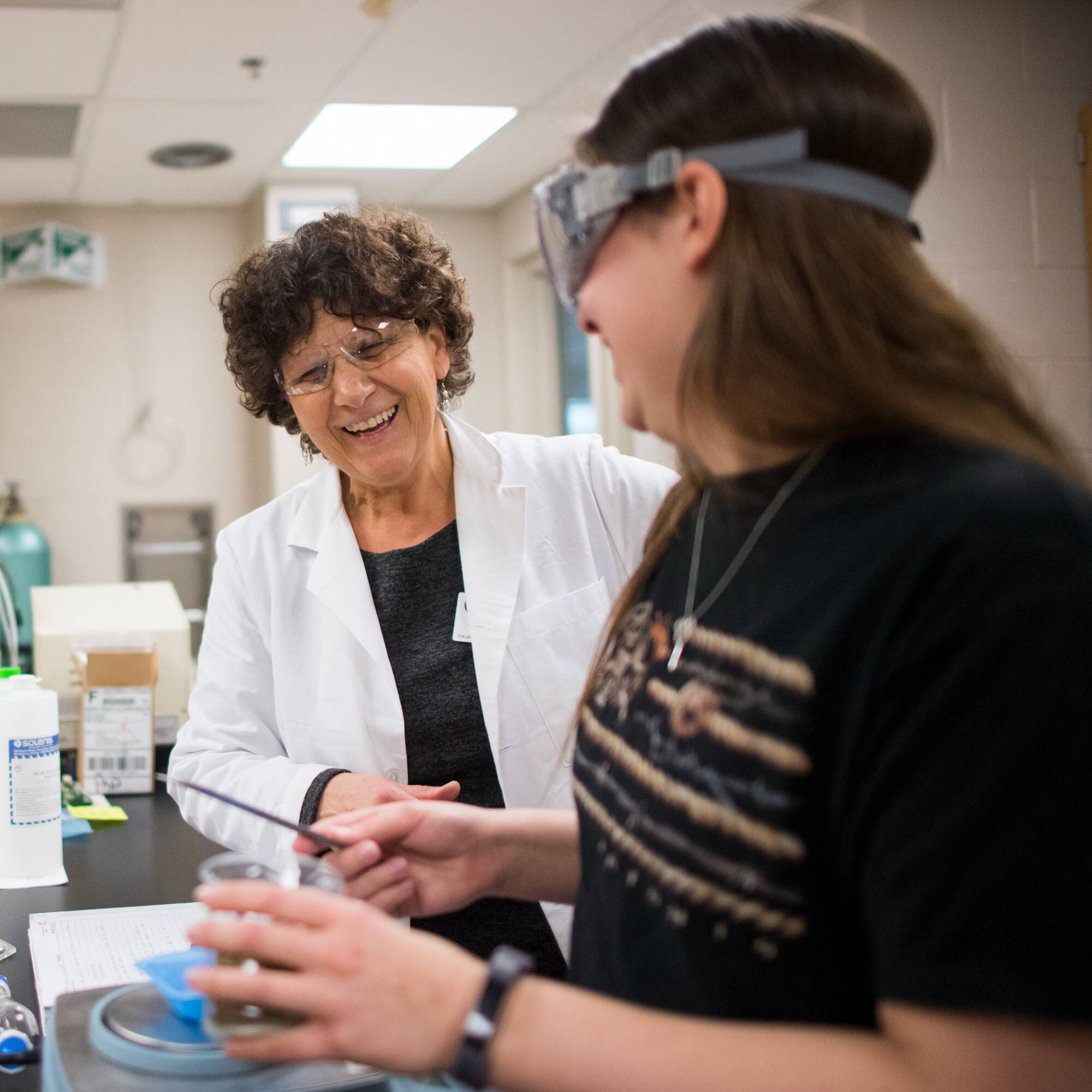 GVSU faculty member with chemistry student.